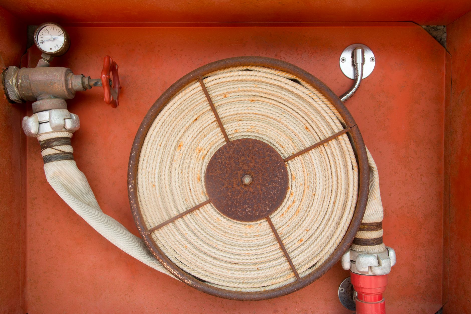 photograph of a rolled fire hose