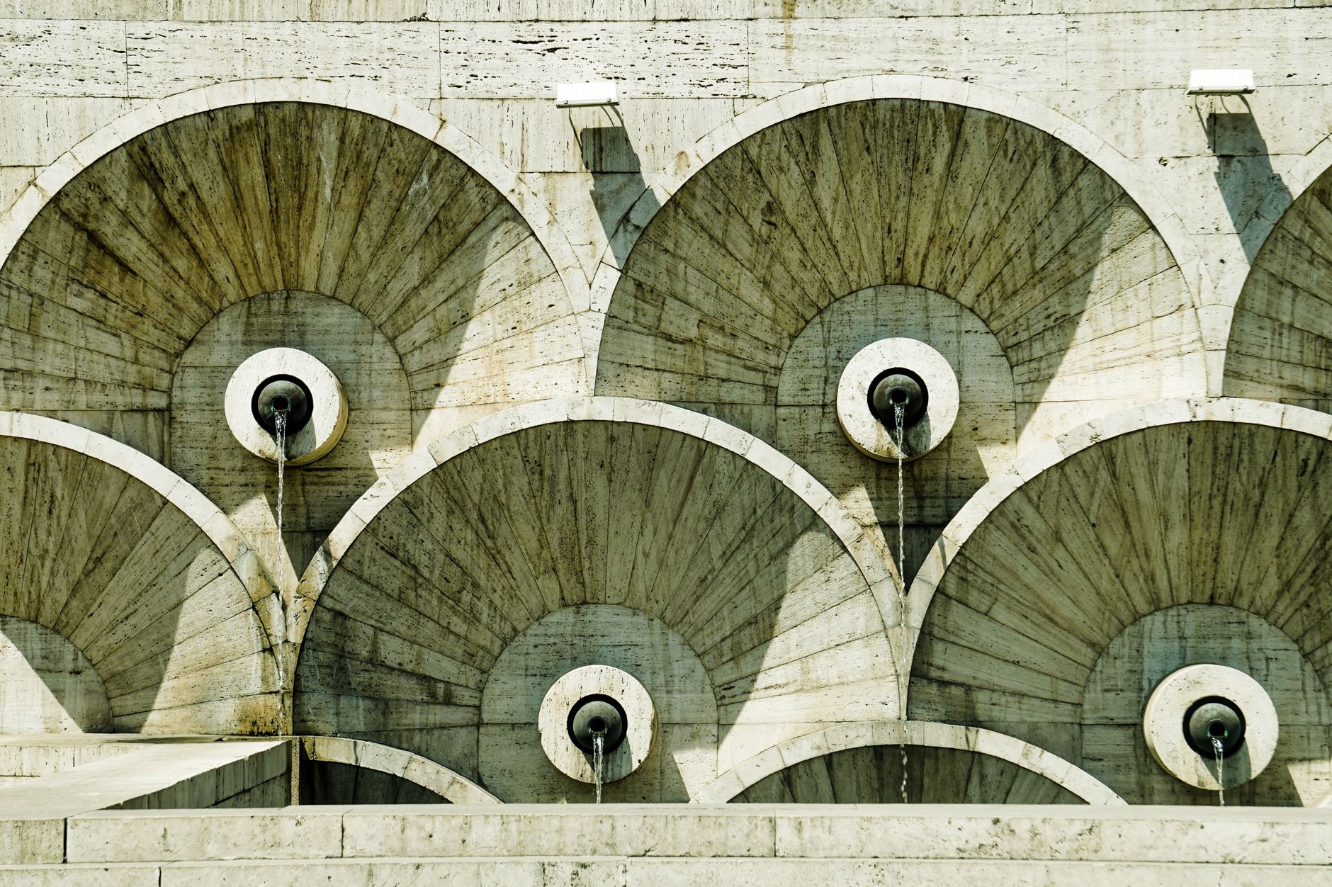 concrete architecture with fountains